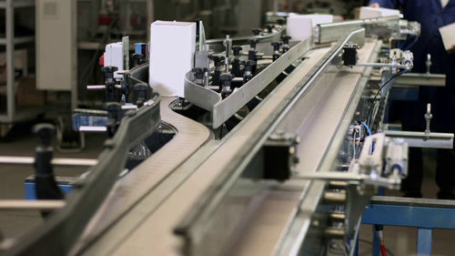 Paletizador para caixas de papelão - Sinterpack - robótico / para caixas / automático