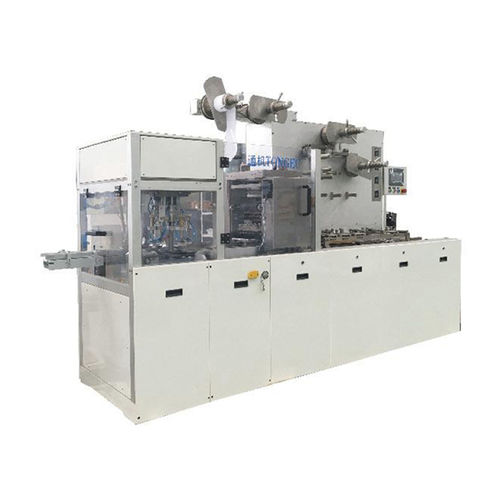 Envolvedora horizontal - SCZ120 - Nantongtongji Co.,LTD. - automática / de papel / com transportador contínuo