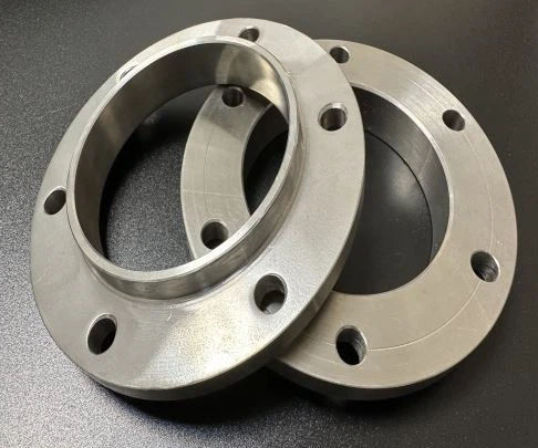 Flange para tubos - Baoji Yinggao Metal Materials Co., Ltd. - em titânio / circular / resistente à corrosão