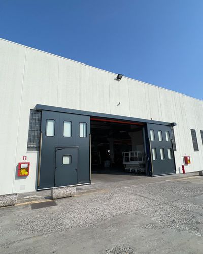 Porta de correr - Moreschi Chiusure Industriali S.r.l. - em aço galvanizado / para ambiente interno / isolada