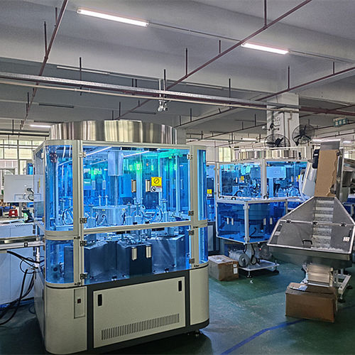 Tampadora rotativa - Shenzhen xinzhong plastic - pneumática / contínua / cápsula