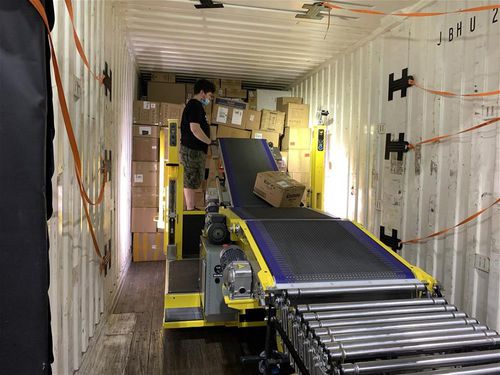 Transportador de esteira - Restuff-it™ - Gorbel - de carregamento / de descarga / modular