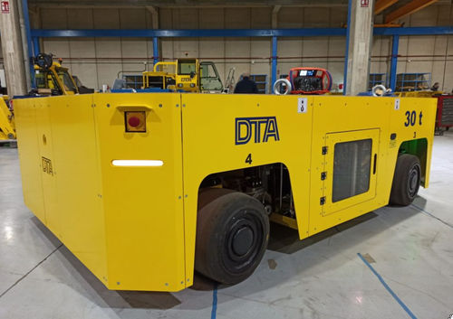 Carro de transferência motorizado elétrico - DTA - para cargas pesadas / elevatório / com roda de Vulkollan®