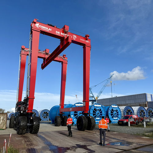 Transportador de contêineres "straddle carrier" elétrico - MST 120 - CIMOLAI TECHNOLOGY - para cargas pesadas / autopropelido / com altura ajustável