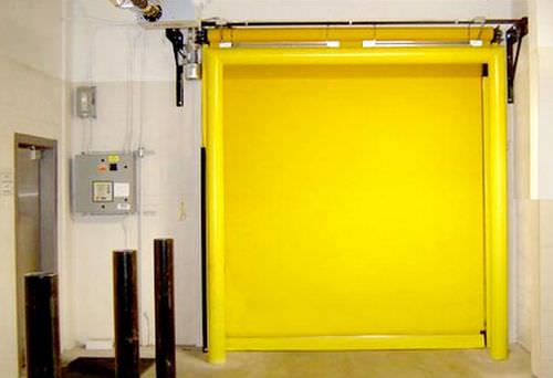 Porta de enrolar - Wilcox Door Service Inc - para câmara frigorífica / industrial / para freezer
