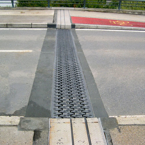 Junta de dilatação em aço - ROBO-STATIFLEX - mageba - quadrada / de encaixe / para construção de ponte