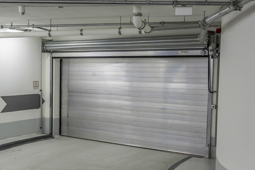 Porta de enrolar - Jansen Tore GmbH & Co.KG - em aço / para ambiente interno