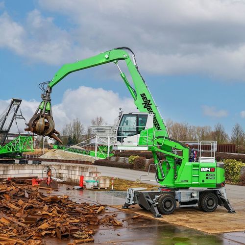 Grua florestal com lança - 824 G - SENNEBOGEN Maschinenfabrik GmbH - com rodas / de esteiras