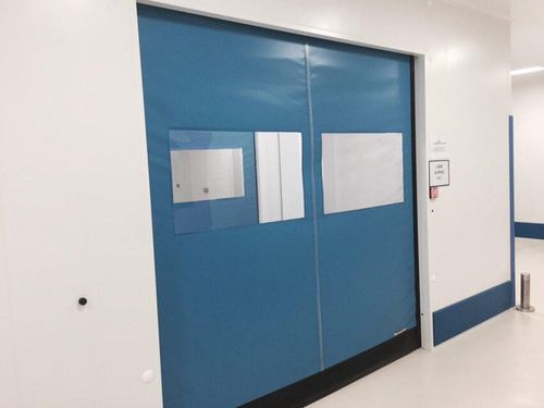 Porta de correr - B.M.P. srl - de enrolar / em aço inoxidável / de PVC