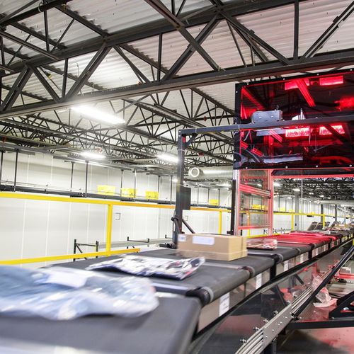 Máquina de separação de tapete transversal - CROSSORTER - VANDERLANDE - para logística / óptica / de processo