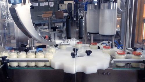 Envasadora-tampadora-rotuladora automática - RTE4U - PMR System Group - controlada por CLP / para contêineres / para cápsulas de rosca