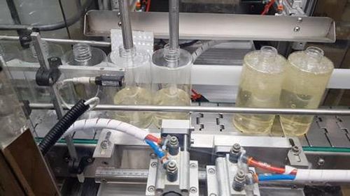 Envasadora-tampadora-rotuladora automática - RTE2U - PMR System Group - de produtos líquidos / de creme / para produtos cosméticos