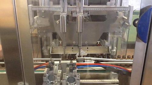 Envasadora-tampadora-rotuladora controlada por CLP - RTE2U CBD - PMR System Group - para óleo / para a indústria farmacêutica / para produtos fitossanitários