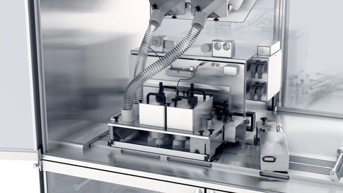Alimentador vibratório - Uhlmann Pac-Systeme GmbH & Co. KG - para produtos farmacêuticos / para sólidos / de cápsula