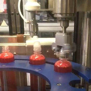 Envasadora-tampadora-rotuladora automática - MONO 54 - Telm srl - rotativa / de xarope / para produtos cosméticos