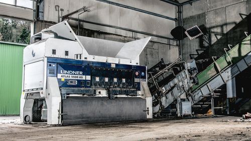 Triturador primário - Atlas 5500 AS - Lindner Recyclingtech GmbH - de dois veios / para resíduos sólidos e a granel / para resíduos plásticos