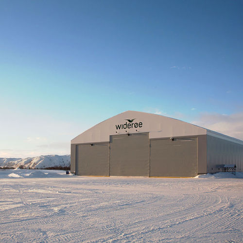 Porta hangar para aviação - NK4 - Champion Door - seccionada / de emparelhar / em tecido
