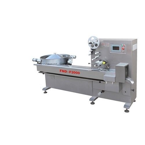 Máquina embaladora controlada por CLP - FND-F2000 - Taizhou Funengda Industry Co., Ltd. - com servoacionamento / horizontal / de embalagens tipo almofada