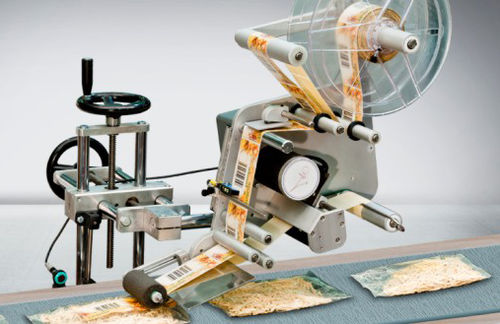 Rotuladora automática - Eticode L series - IBERTOPJET, S.L. - para embalagens / para aplicação lateral / para aplicação na parte superior